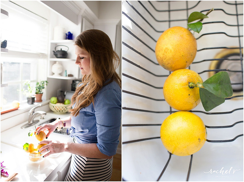 Woman in kitchen arranging lemons